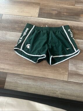 Nike Green Athletic Shorts with White Trim and Spartan Logo